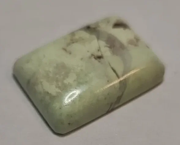 Click Crystal Fast Green cabuchin — Crystal Cave Minerals